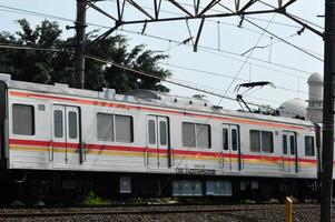 Commuter Line or electric train in Jakarta, Indonesia. photo