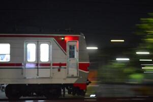 Commuter Line or electric train in Jakarta, Indonesia. photo