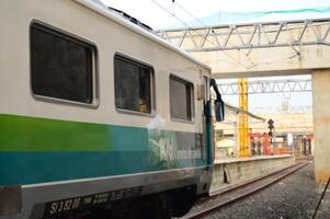 Commuter Line or electric train in Jakarta, Indonesia. photo