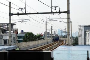 Commuter Line or electric train in Jakarta, Indonesia. photo