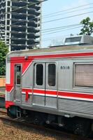 Commuter Line or electric train in Jakarta, Indonesia. photo