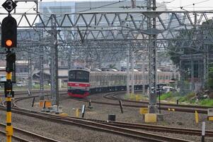 Commuter Line or electric train in Jakarta, Indonesia. photo