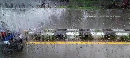 View of the highway from the foggy glass photo