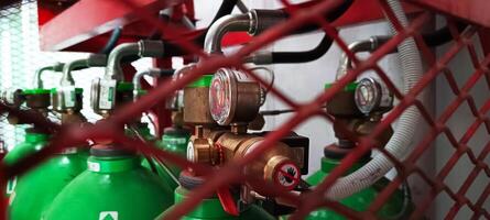 Fire suppression system tube in a cage photo