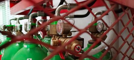 Fire suppression system tube in a cage photo