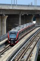 View of the train from afar moving with beautiful views photo