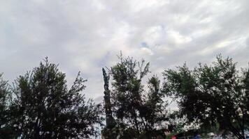 View of the sky from under the LRT train line photo