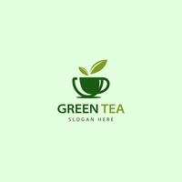 un sencillo logo diseño para un verde té empresa presentando un verde taza con verde té hojas adentro, sentado en un platillo vector