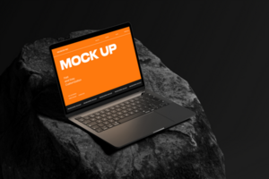 Laptop and keyboard on the rock with dark scene psd