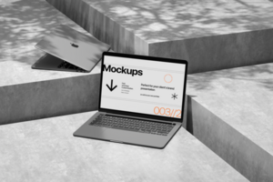 Laptop mockup with realistic shadow and concrete scene psd