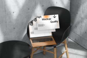 Multiple screen laptop mockup set on wall background and realistic chair psd