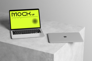 Laptop mockup set on the concrete and wall background psd