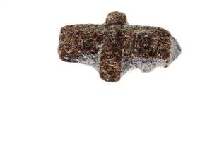 macro mineral stone Staurolite on a white background photo