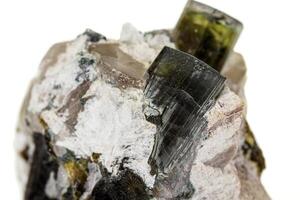 Macro tourmaline mineral stone on white background photo