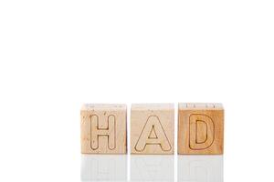 Wooden cubes with letters had on a white background photo