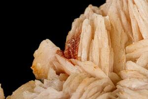 Macro stone Vanadinite Baryte mineral on a black background photo