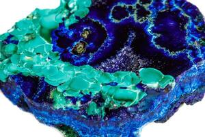 Macro mineral stone malachite with azurite on white background photo