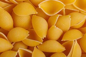 Pasta products in the form of a shell, texture photo