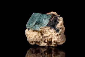 macro mineral stone aquamarine on a black background photo