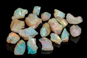 macro mineral stone rare and beautiful opals on a black background photo