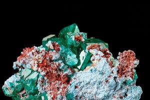 macro mineral stone Dioptase on a black background photo