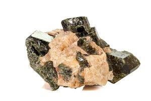 Macro of a mineral stone Vesuvianite on a white background photo