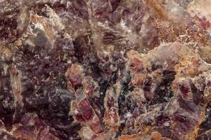 macro Roca mineral fluorita en un negro antecedentes foto