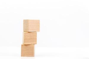Wooden cubes on a white background photo