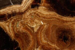 Macro stone mineral onyx marble on a black background photo