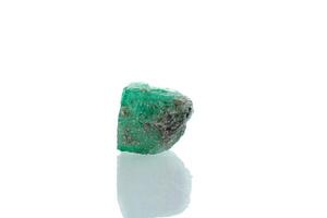 macro mineral stone emerald on a white background photo