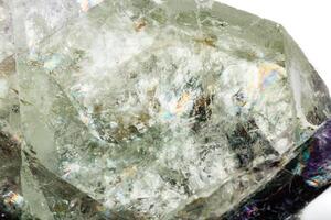 Macro of a mineral stone Fluorite on a white background photo