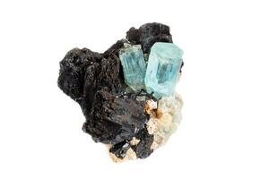 Macro mineral stone Aquamarine and black tourmaline, Schorl on a white background photo