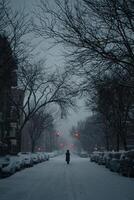 Man walking alone in snow down Brooklyn New York street photo