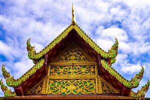 Golden Wat Phra That Doi Suthep temple building Chiang Mai Thailand. photo