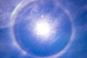 Rainbow circle around the sun in the sky Bentota Beach Sri Lanka. photo