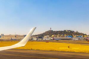 Aircraft at the airport Building and runway Mexico City Mexico. photo