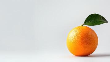 Fresh orange with a green leaf on a clean white background, simplicity and health photo