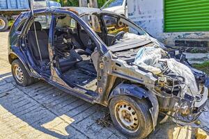 Puerto Escondido Oaxaca Mexico 2022 Broken down car Vehicle transportation in the workshop outside Mexico. photo