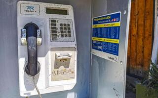 Puerto Escondido Oaxaca Mexico 2022 Old telephone box with handset and keypad Puerto Escondido Mexico. photo