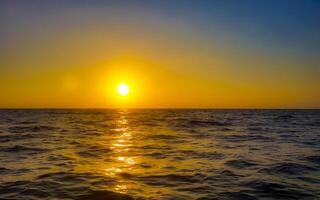 Maldives tropical paradise island golden sunset view from Rasdhoo. photo
