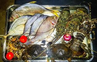 Lobster Shrimps Crabs Squid Seafood in Bentota Beach Sri Lanka. photo