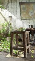 An abandoned room with a chair and table in a state of devastation video