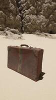 A piece of luggage sitting on top of a sandy beach video