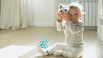 Kid girl playing with soft toy at home or kindergarten video