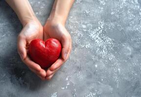 Person Holding Red Heart photo