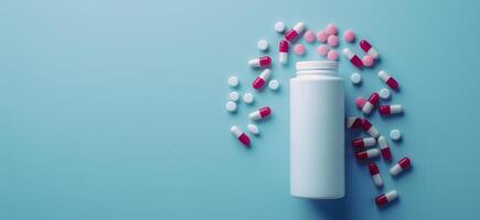 Bottle Filled With Pink and White Pills photo