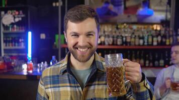 Portrait of a man with beer in a pub video