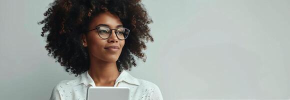 Young Woman Using Tablet Computer photo