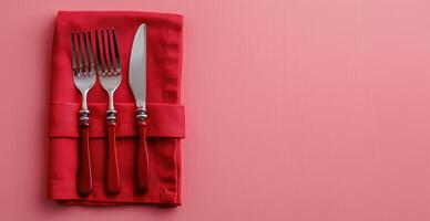 Red Plate With Knife and Fork photo