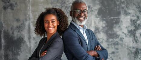 Two Business People in Front of Gray Background photo